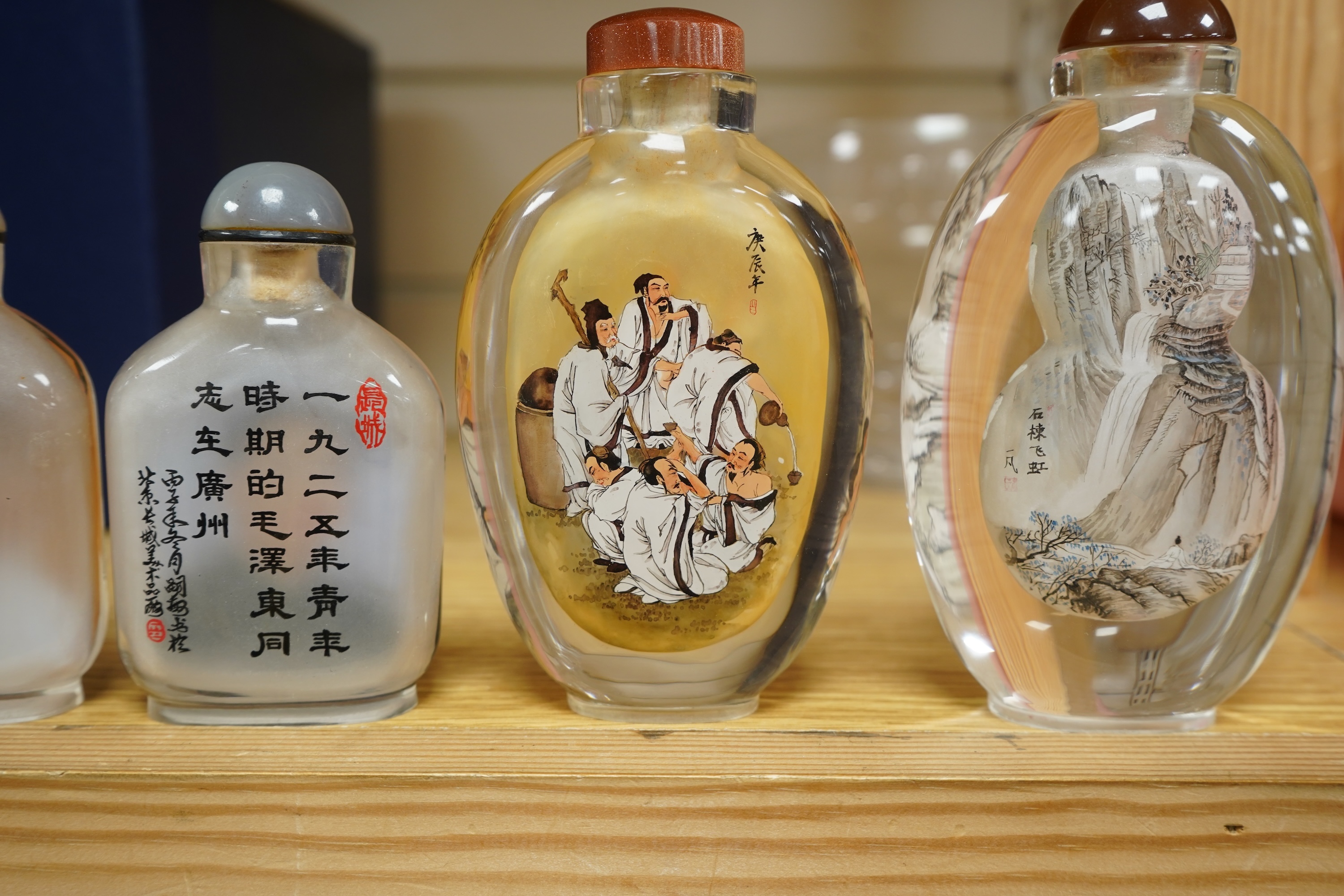 Four Chinese inside painted glass snuff bottles, 1960's-80's, tallest 13.5cm